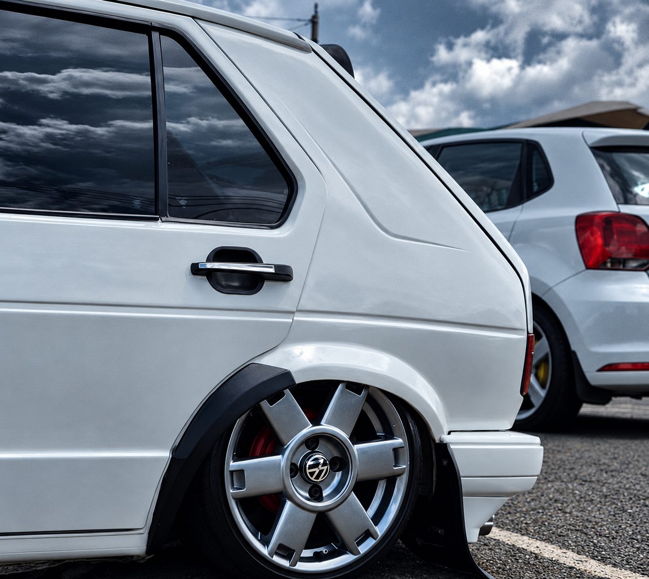 Bagged white VW Golf rear wheel